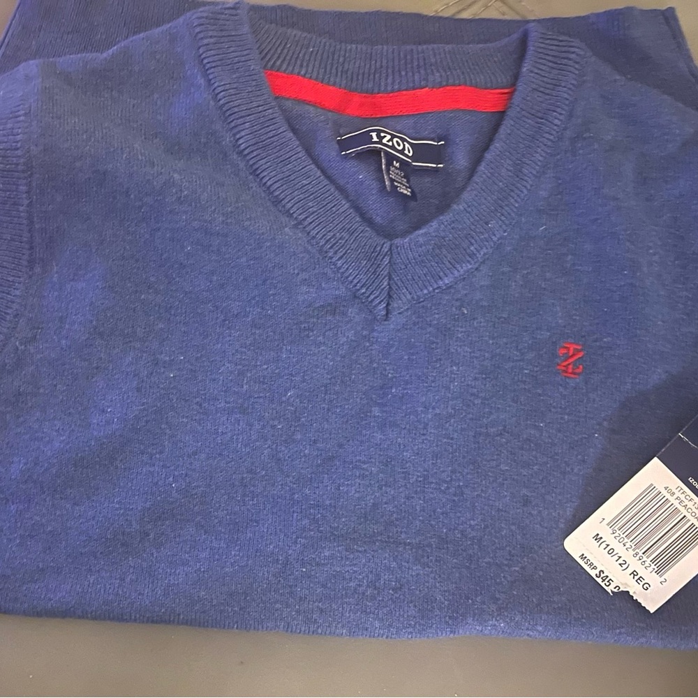 Two brand new Izod big boy sweater vests. One red. One blue.